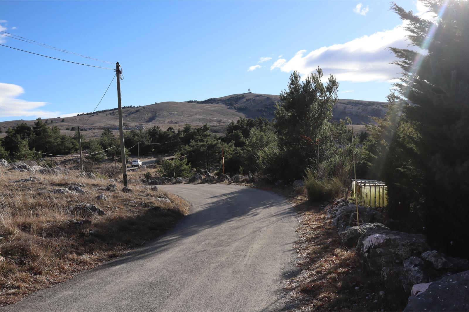 Thursday January 18th 2024, Plateau de Caussols, South of France, view of the road just after the entrance gate before. In this photo you can see what appears to be water resevoirs when in the other they were covered in snow.