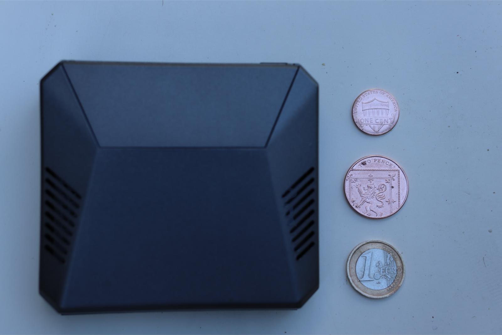 Raspberry PI 4B (4G mem) in Argon One (V1) case with 1 cent US, 2 pence UK, 1 Euro coins to give size